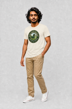 Man wearing natural cream dachshund golf t-shirt with Short Game Specialist crest print