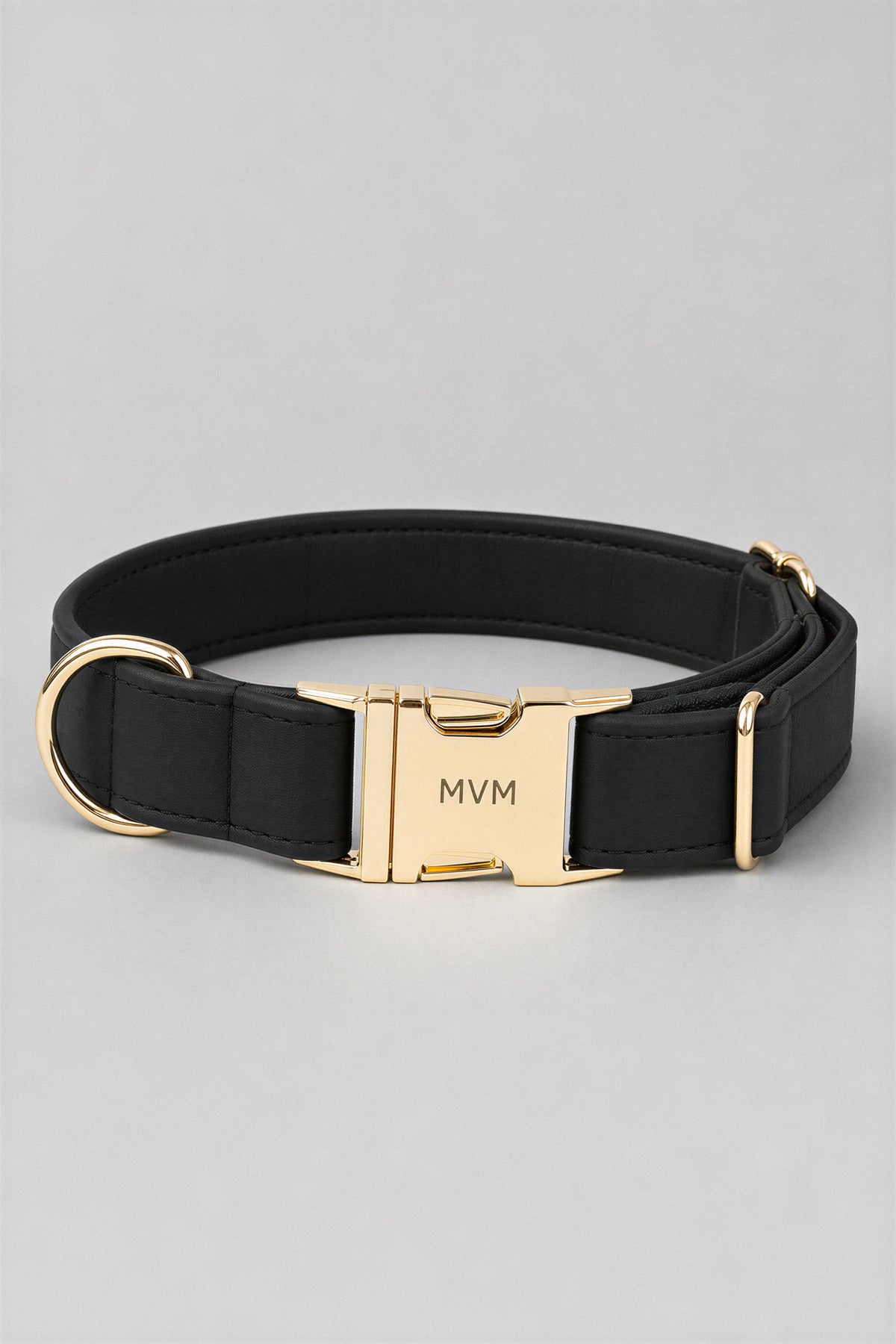 Black velvet MVM Evergreen dog collar with engraved gold MVM buckle, detail
