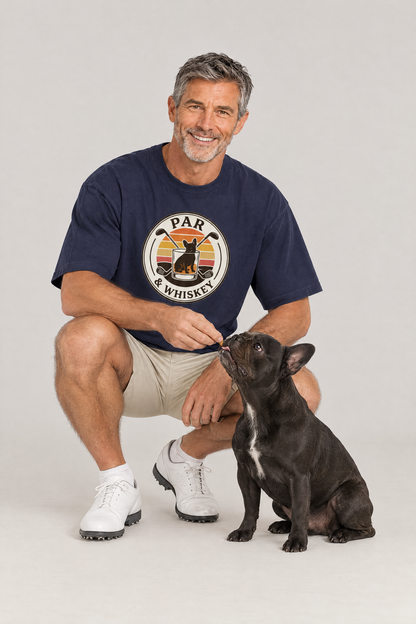 Man crouching with a black French bulldog in the navy Par & Whiskey French Bulldog Badge Golf Tee. Color: Navy