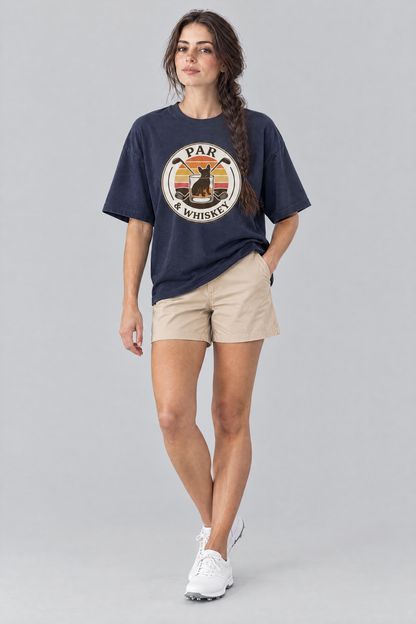 Woman wearing the Par & Whiskey French Bulldog Badge Golf Tee in navy with beige chino shorts. Color: Navy