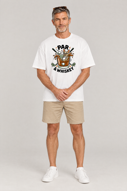 Man wearing the Par & Whiskey French Bulldog Splash Golf Tee in white with khaki golf shorts and sunglasses on his head. Color: White