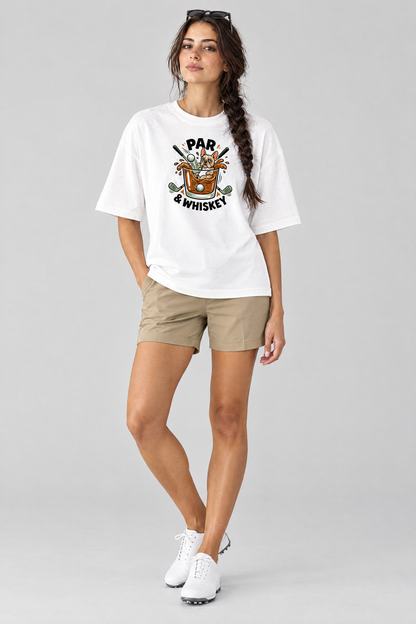 Woman wearing the Par & Whiskey French Bulldog Splash Golf Tee in white with khaki golf shorts and sunglasses on her head. Color: White
