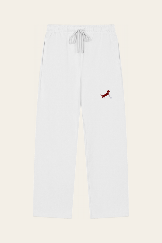 Flat lay of white Putting dachshund golf sweatpants with the small burgundy dachshund putter print on the left thigh, front view on warm off-white background. Color: White