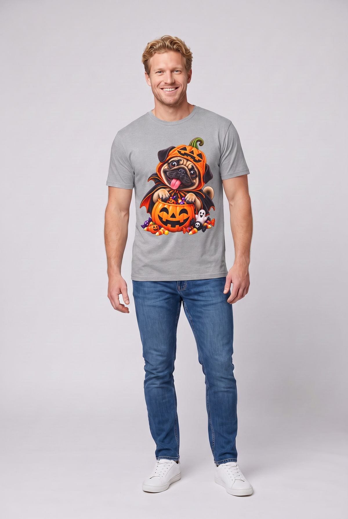 Man wearing a sport grey pug Halloween t-shirt with a pug in a pumpkin costume and candy bucket, front view