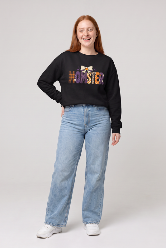 Woman wearing the Momster Halloween sweatshirt in black, three-quarter view. Color: Black