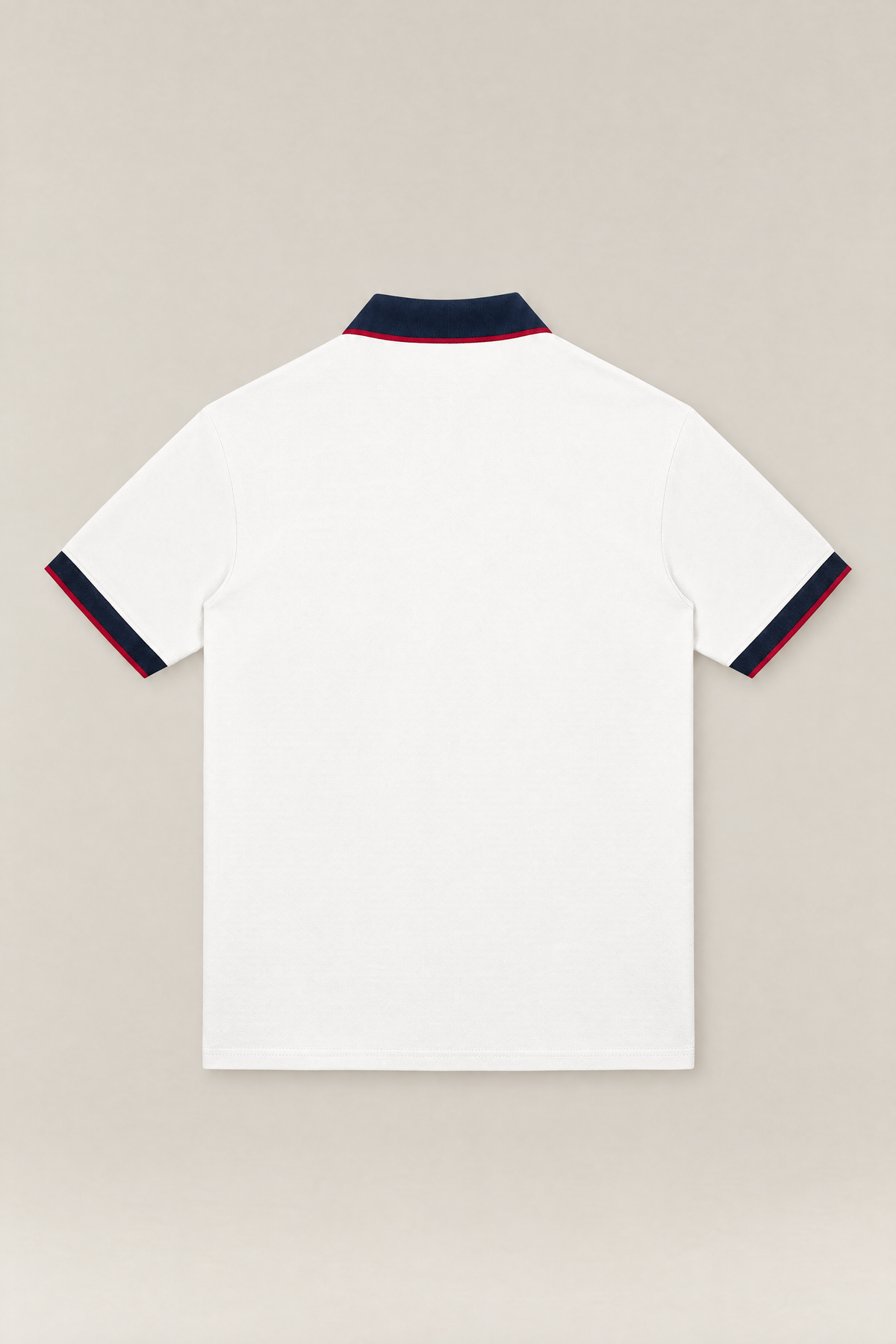 Club Crest color block polo in white with navy collar and cuffs, back view packshot. Color: White with Navy Blue