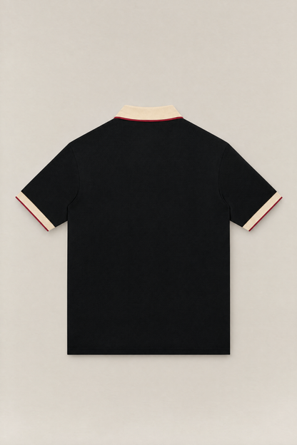 Club Crest color block polo in black with apricot collar and cuffs, back view packshot. Color: Black with Apricot