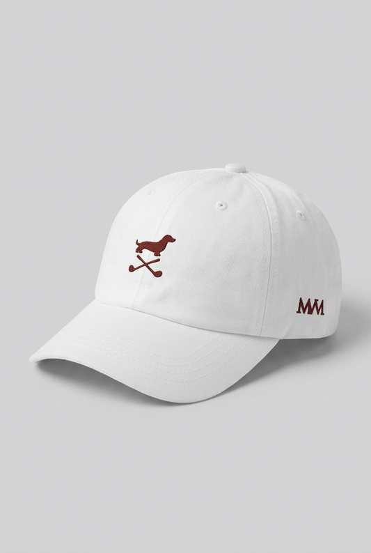 Color: White. Golf cap, angled side view with burgundy Club Mark dachshund and MVM monogram