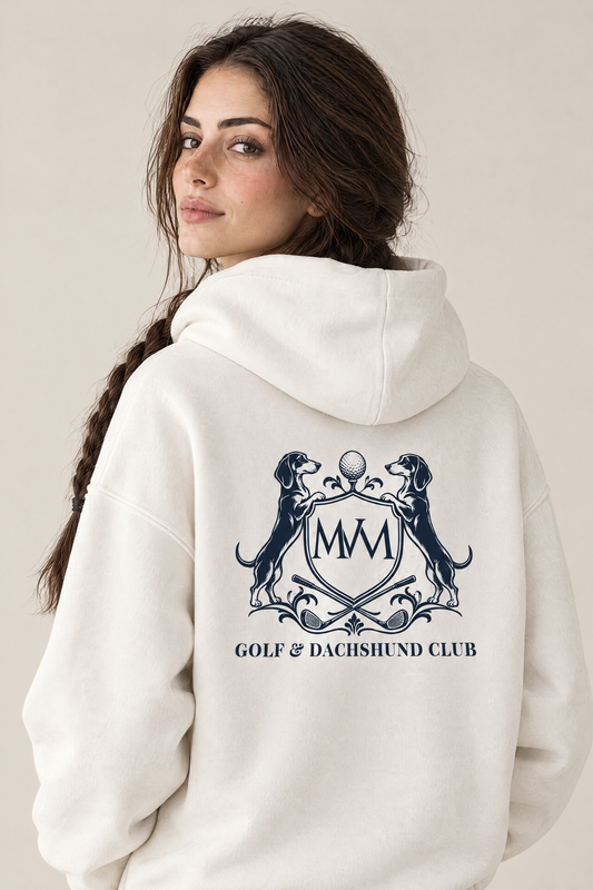 Back view of the white Club Crest hoodie with a large navy Golf & Dachshund Club crest below the hood