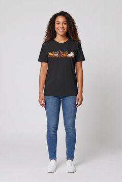 Woman wearing a black wiener dog Halloween parade t-shirt with five dachshunds dressed as hot dog, mummy, witch, pumpkin and ghost, front view