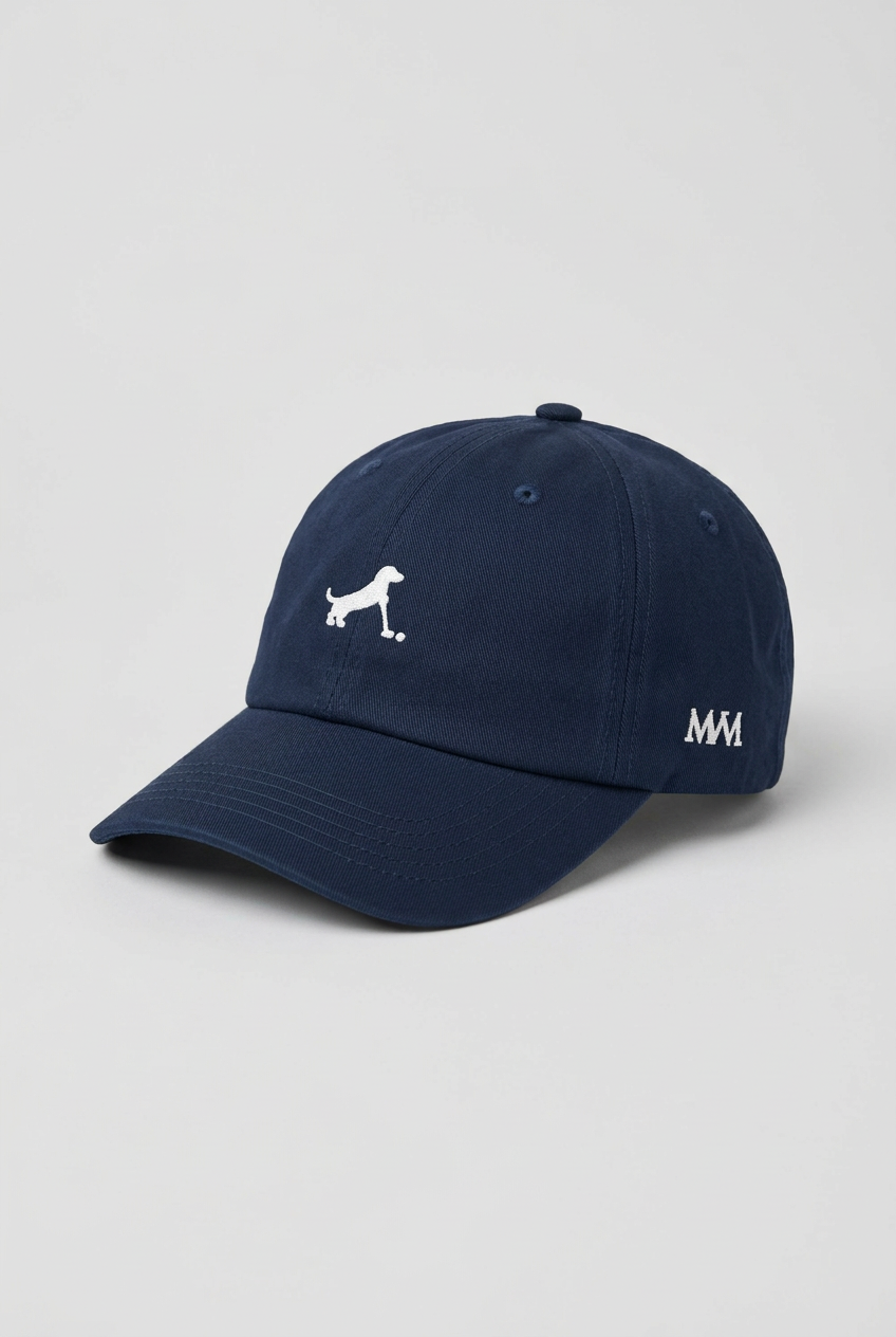 Color: Navy. Golf cap, angled side view with white Putting dachshund and MVM monogram