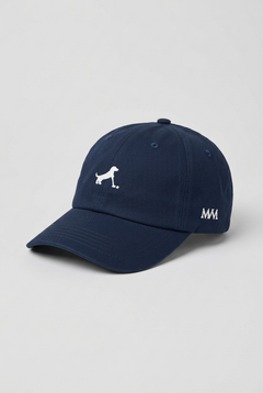 Color: Navy. Golf cap, angled side view with white Putting dachshund and MVM monogram