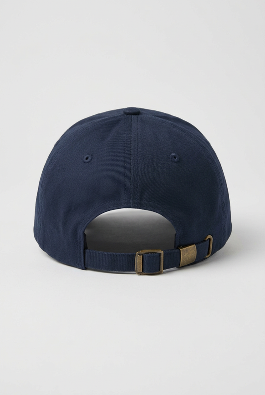 Color: Navy. Navy golf cap, back view with adjustable brass buckle strap
