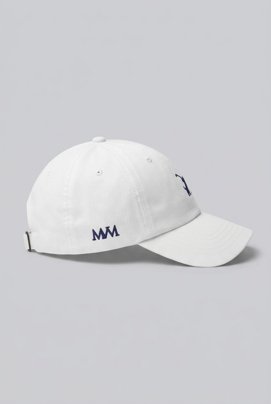 Color: White. Golf cap, angled side view with navy Swing dachshund and MVM monogram