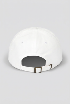 Color: White. White golf cap, back view with adjustable brass buckle strap