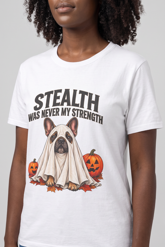 Close-up of the chest print on a white French bulldog Halloween t-shirt with a Frenchie ghost and the text Stealth Was Never My Strength