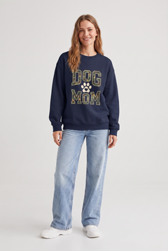 Woman wearing the Camo Dog Mom sweatshirt in navy, front view. Color: Navy