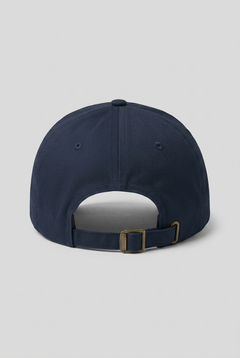 Color: Navy. Navy golf cap, back view with adjustable brass buckle strap