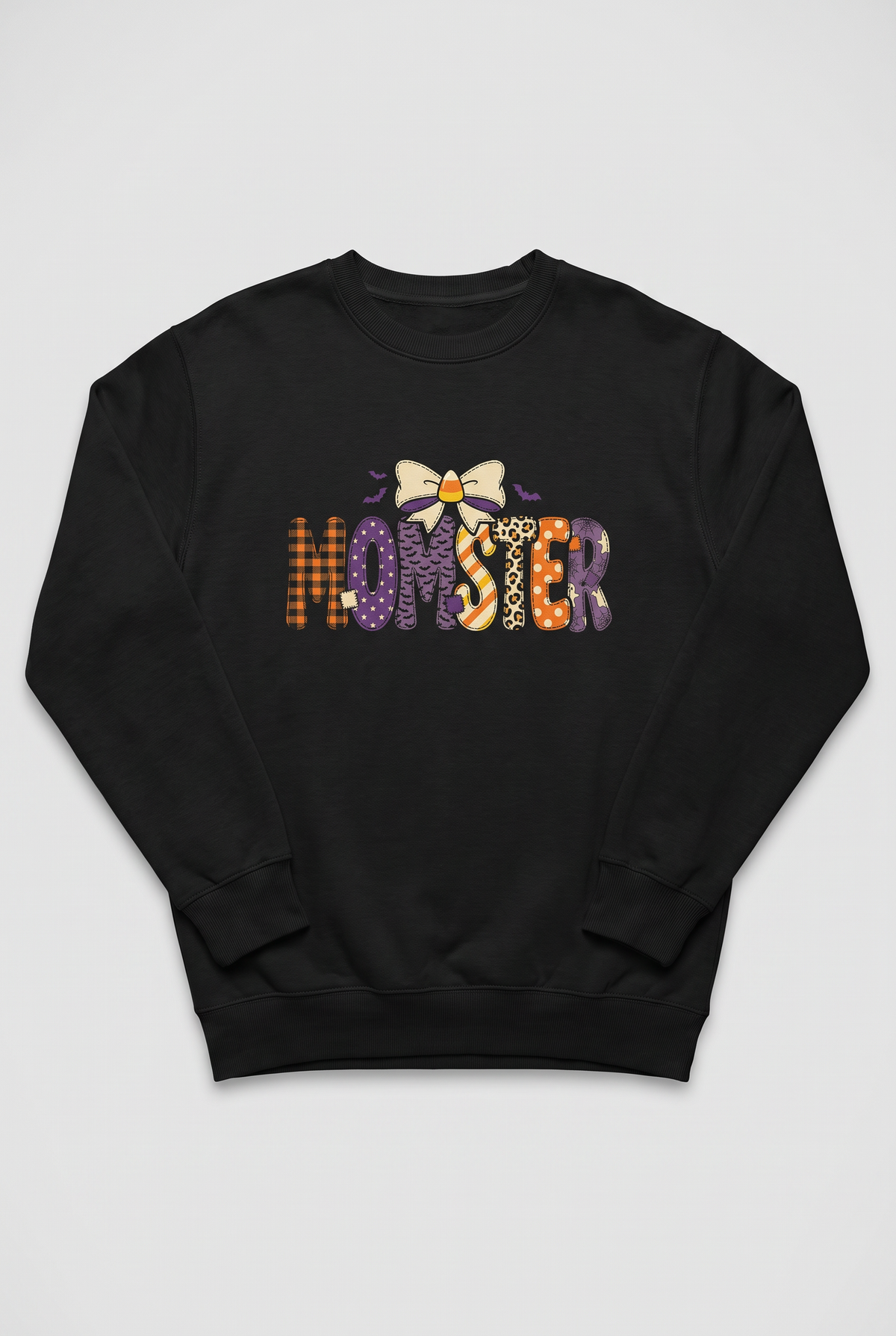 Momster Halloween sweatshirt in black, flat lay. Color: Black