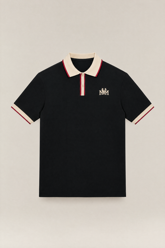 Club Crest color block polo in black with apricot collar, placket and cuffs, front view packshot. Color: Black with Apricot