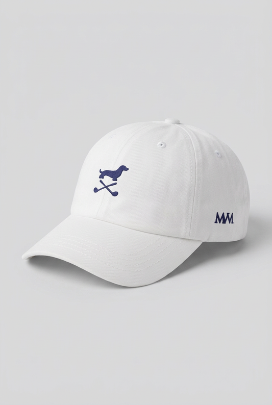 Color: White. Golf cap, angled side view with navy Club Mark dachshund and MVM monogram