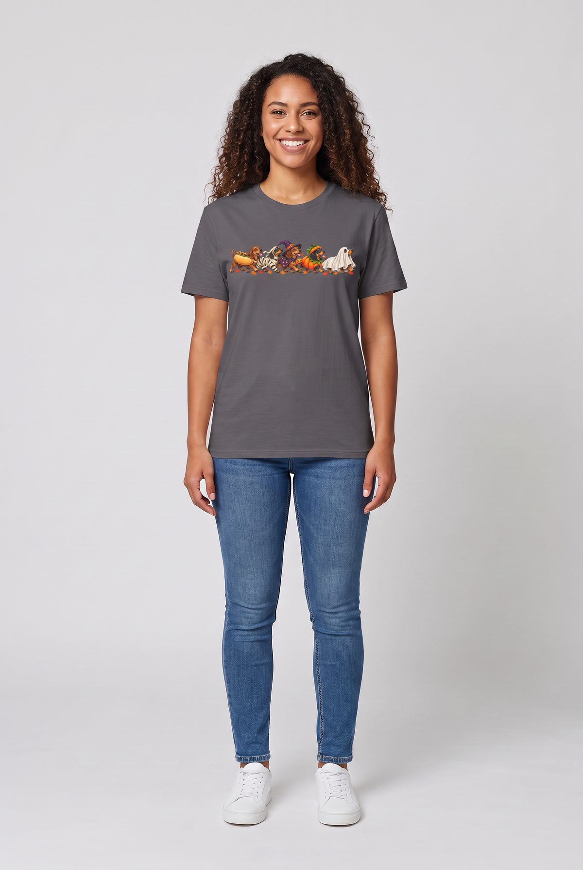 Woman wearing a charcoal wiener dog Halloween parade t-shirt with five dachshunds dressed as hot dog, mummy, witch, pumpkin and ghost, front view
