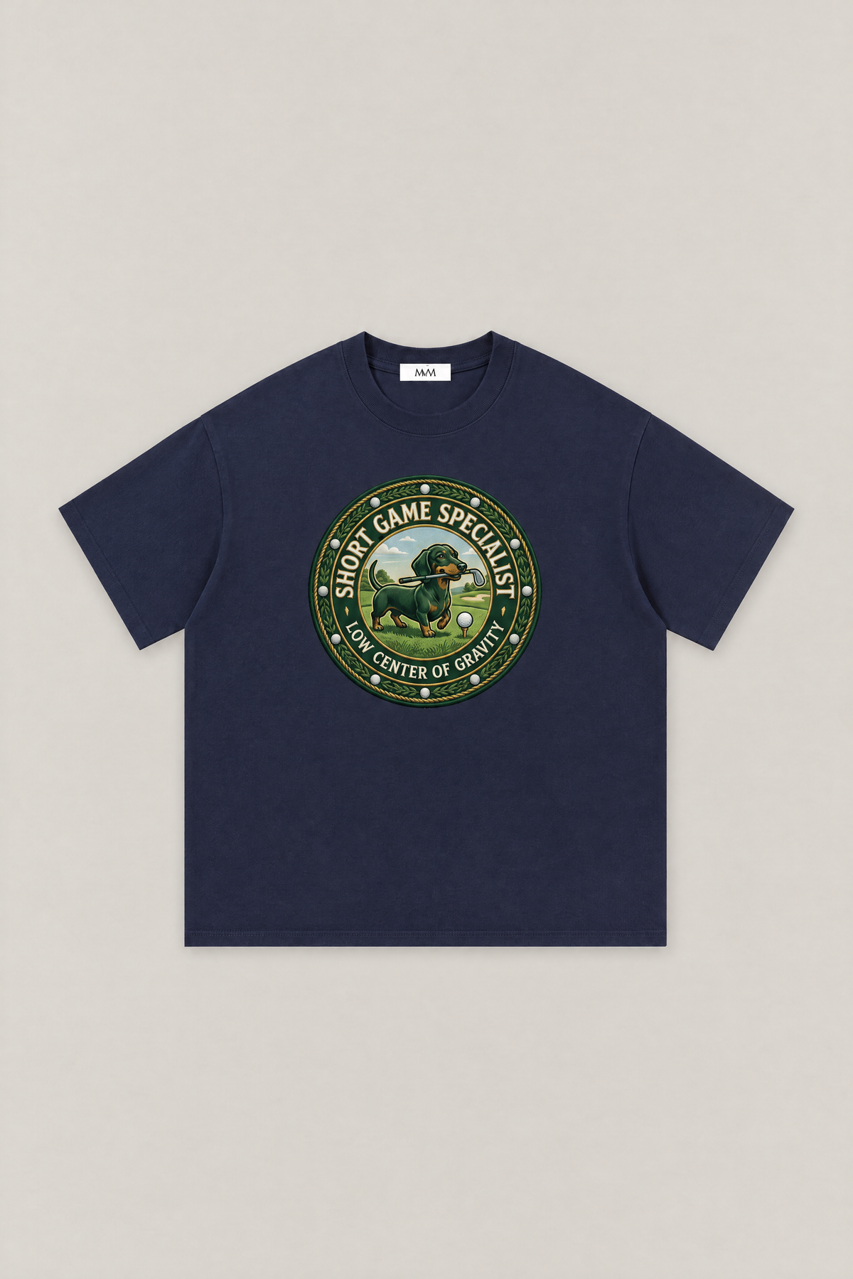 Short Game Crest Dachshund Golf Tee in navy, flat lay front view. Color: Navy