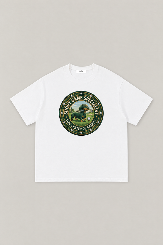 Short Game Crest Dachshund Golf Tee in white, flat lay front view. Color: White
