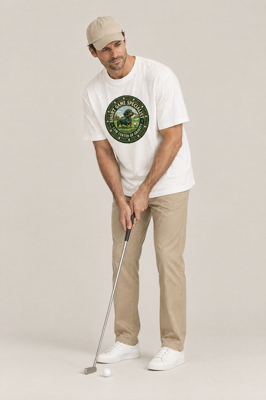 Man lining up a putt in the white Short Game Crest Dachshund Golf Tee. Color: White