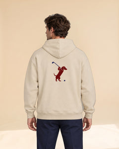 Man wearing Club & Swing dachshund golf hoodie, back studio view. Color: Apricot