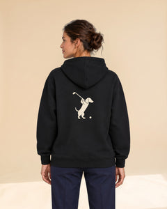 Woman wearing Club & Swing dachshund golf hoodie, back studio view. Color: Black