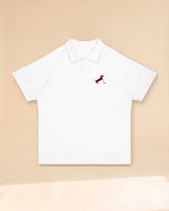 Putting dachshund golf polo, front flatlay. Color: White