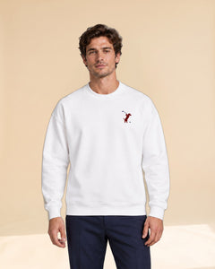 Man wearing Swing dachshund golf sweatshirt, front studio view. Color: White
