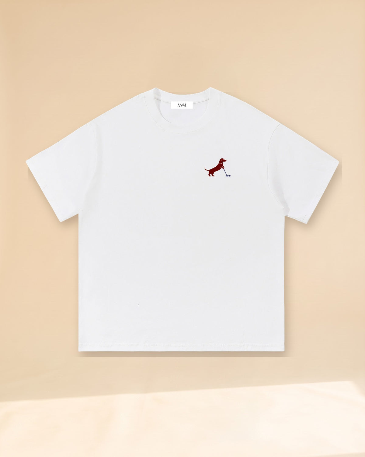 Putting dachshund golf T-shirt, front view. Color: White