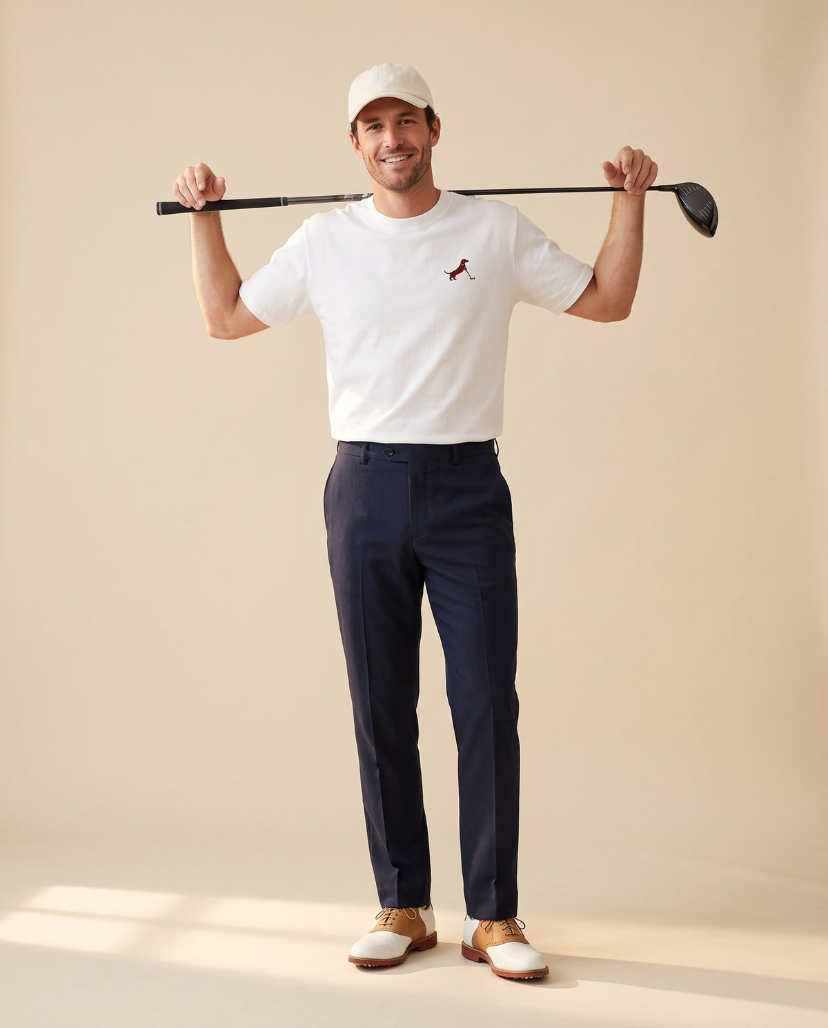 Man wearing Putting dachshund golf T-shirt, full-body studio look. Color: White
