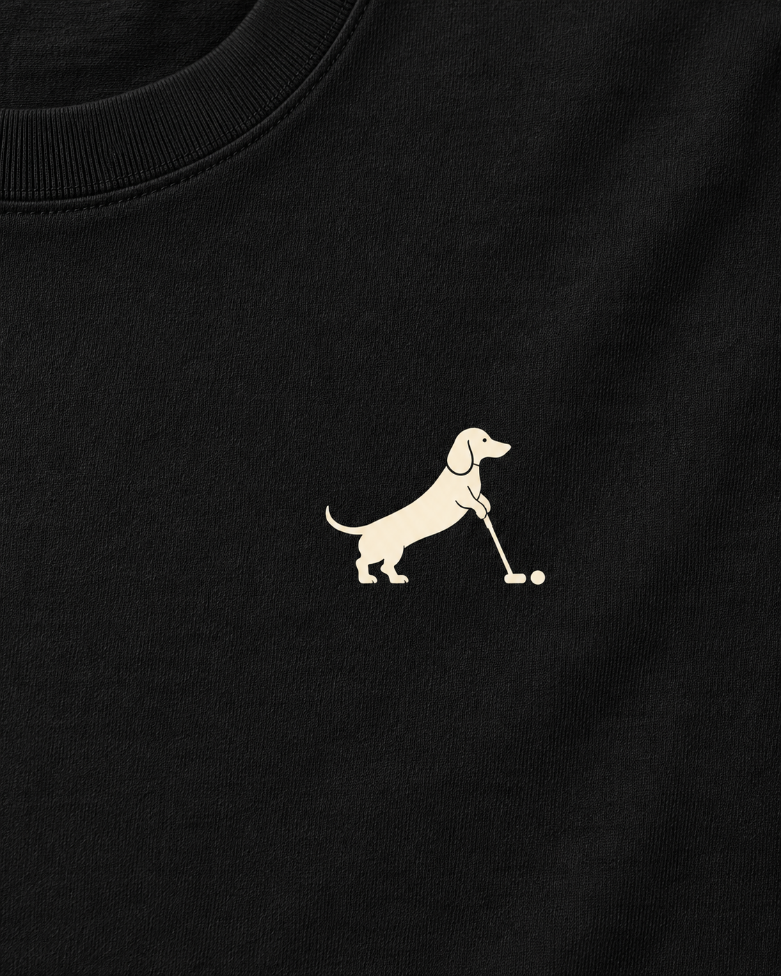 Putting dachshund golf T-shirt print detail. Color: Black
