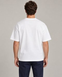 Man wearing Putting dachshund golf T-shirt, back studio view. Color: White