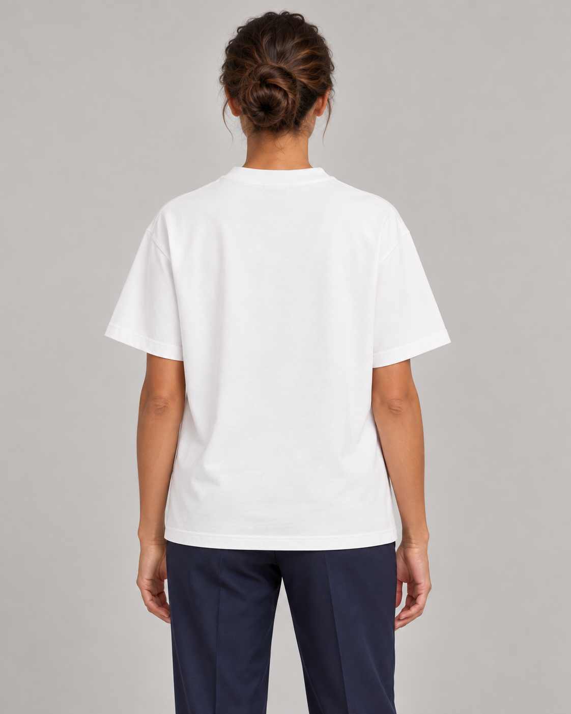 Woman wearing Putting dachshund golf T-shirt, back studio view. Color: White