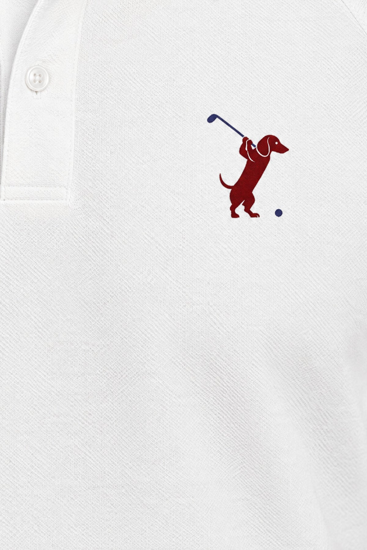 Close-up of the collar and chest logo on the white Swing dachshund golf polo. Color: White