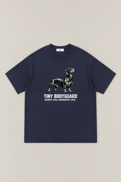 Tiny Bodyguard Dachshund Tee in navy, flat lay front view. Color: Navy
