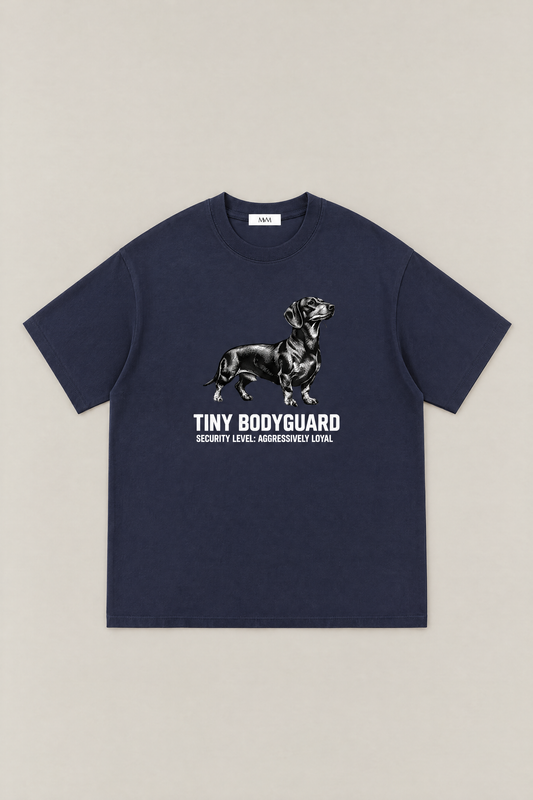 Tiny Bodyguard Dachshund Tee in navy, flat lay front view. Color: Navy