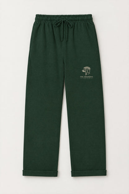 Flat lay of Underdog Golf Club dachshund crest sweatpants in Blackish Green. Color: Blackish Green
