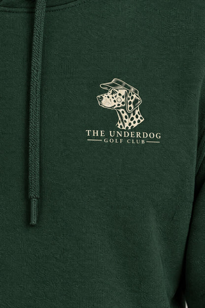 Close-up of The Underdog Golf Club Dalmatian crest printed on the left chest of the Blackish Green hoodie. Color: Blackish Green