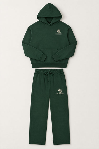 Flat lay of The Sweet Spot Dalmatian golf hoodie and matching sweatpants in Blackish Green. Color: Blackish Green