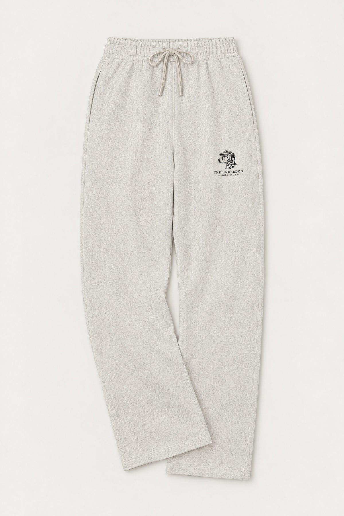 Flat lay of Underdog Golf Club Dalmatian crest sweatpants in Oat Gray. Color: Oat Gray