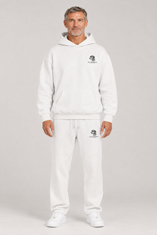 Man wearing The Sweet Spot Dalmatian golf hoodie and matching Underdog Golf Club sweatpants in White, front view. Color: White