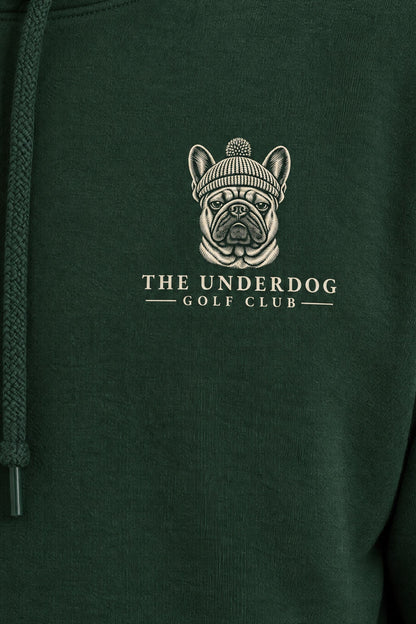 Close-up of The Underdog Golf Club French Bulldog crest printed on the left chest of the Blackish Green hoodie. Color: Blackish Green