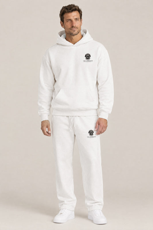 Man wearing The Heavy Hitter pug golf hoodie and matching Underdog Golf Club sweatpants in White, front view. Color: White